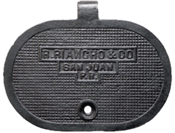 manhole cover with family name brand dark-grey steel